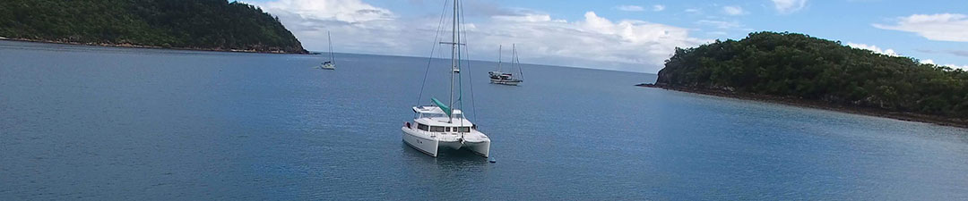 Sailing Catamaran anchored in the water